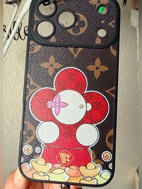 Designer-Style Brown Phone Case with Red & White Floral Character 17 pro max